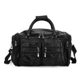 Black leather-panelled travel bag (with detachable shoulder strap)