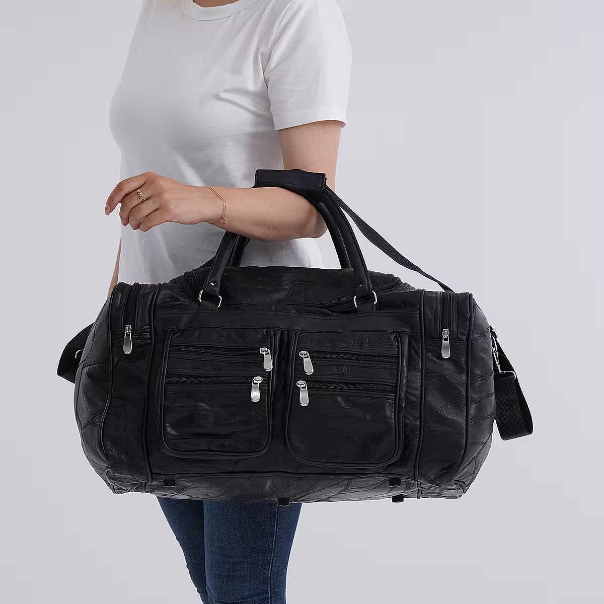Black leather-panelled travel bag (with detachable shoulder strap)
