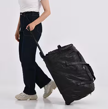 Black Patchwork Sheepskin Wheeled Travel Bag
