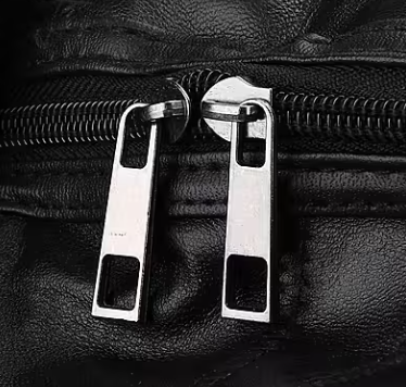 Black Patchwork Sheepskin Wheeled Travel Bag