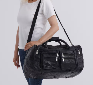 Black leather-panelled travel bag (with detachable shoulder strap)